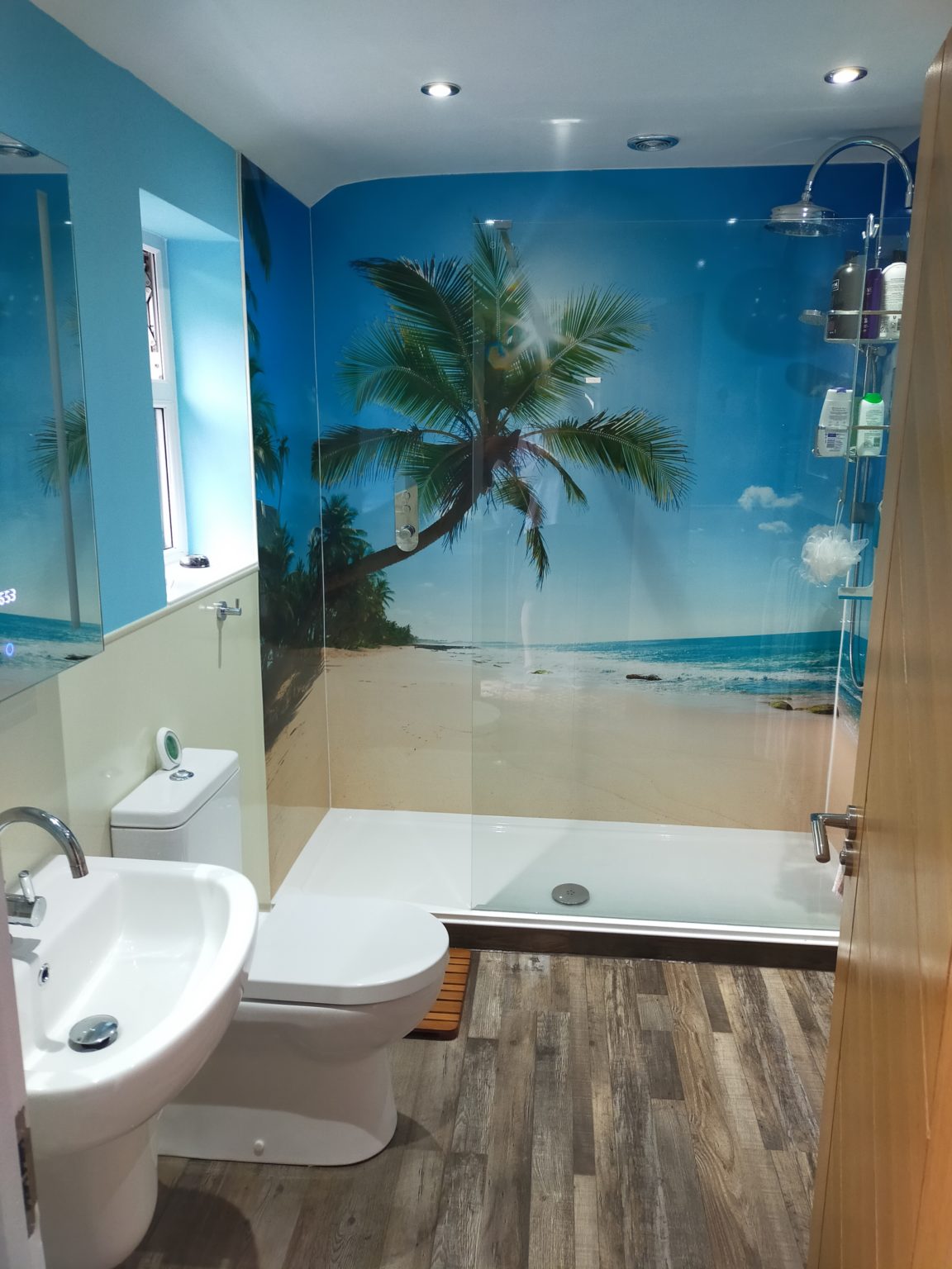 Fun blue palm leaf wallpaper half bath | Powder room decor, Outdoor bathroom  design, Luxury kitchen design